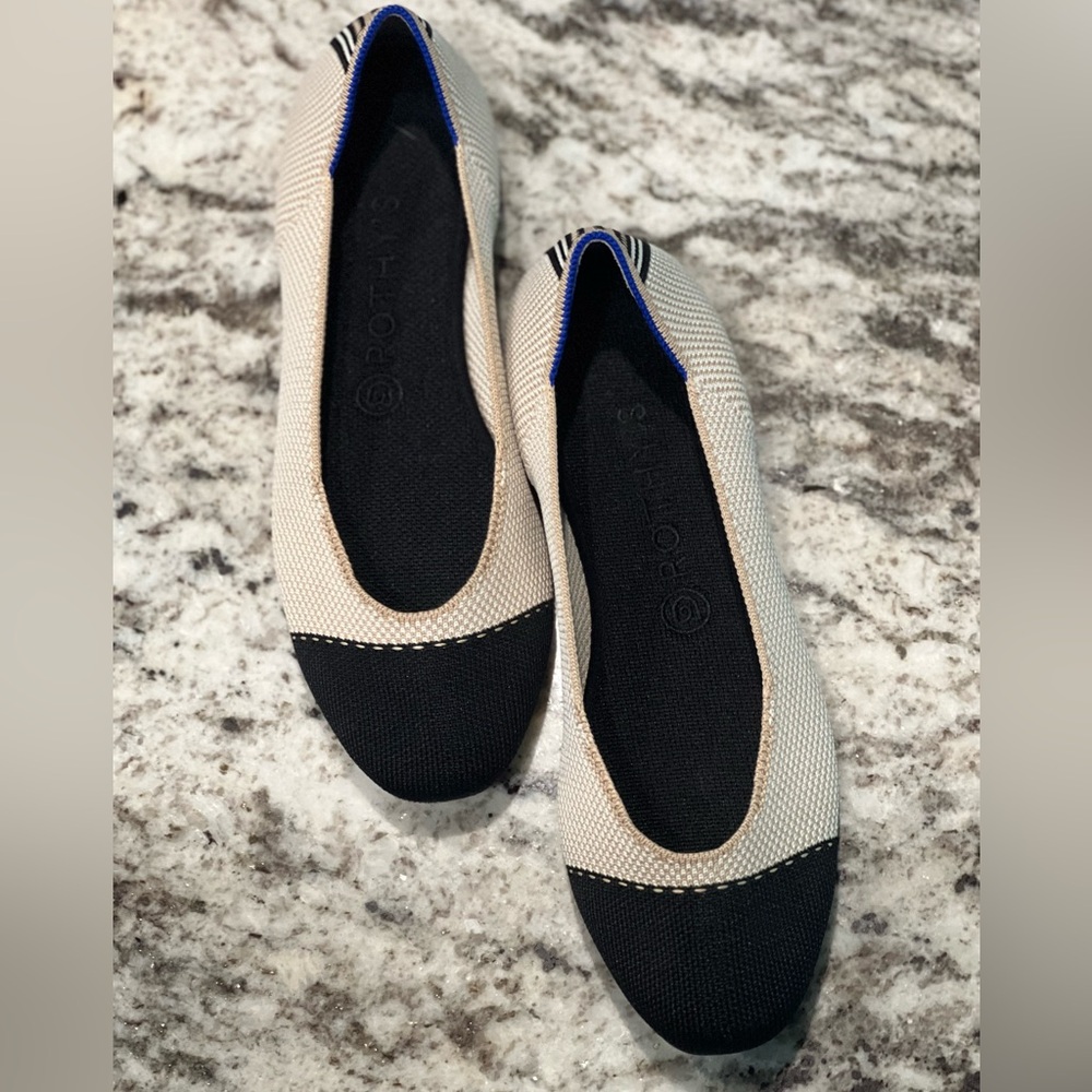 Rothy’s Women’s Black and Cream Capped Toe Flats